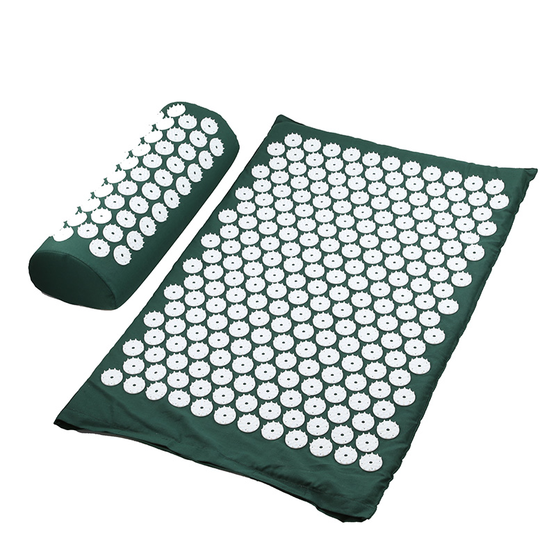 Green acupressure yoga mat and massage cushion set with white circular spike pads