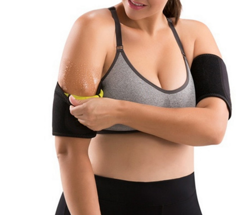 Black arm compression sleeve covering upper arm and forearm, close-up.