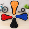 Bike seat cushion cover set in orange, red, blue, and black with gel-textured panels