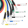 Close-up resistance bands with metal carabiner clips and foam grips in multiple colors