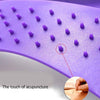 Purple massage stretcher arch with raised acupressure nubs