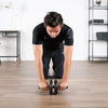 Ab roller trainer used in kneeling rollout, showing two wheels and center grip