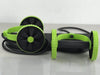 Ab roller wheel tool with green bars, two black wheels, and padded support handles