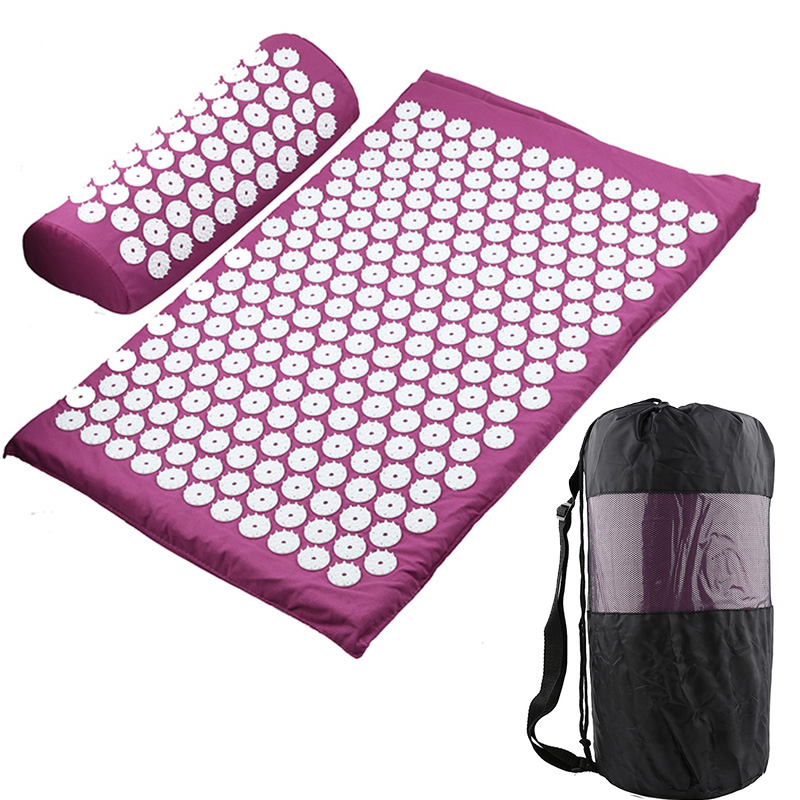 Acupressure yoga mat and massage cushion set in purple with white button pads and carry bag