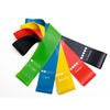 Color-coded resistance band set with strength labels from X-light to Heavy