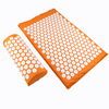 Acupressure yoga mat and massage cushion set in orange with white button pads