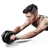 Ab roller trainer with black wheels and foam grips during plank exercise