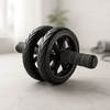Double-wheel ab roller trainer with black ribbed wheels and foam handles