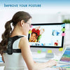Posture corrector belt on back, black padded harness with adjustable straps