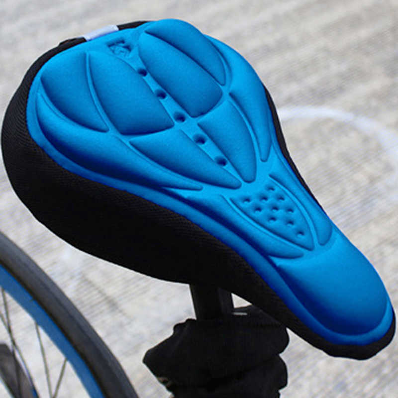 Bike seat cushion cover, blue gel insert with ribbed channels and small dot pattern