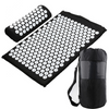 Black acupressure yoga mat set with matching cushion and carrying bag