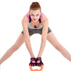 Black half-finger gym gloves with pink trim, worn with open fingertips and padded palms