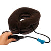 Neck traction pillow with handheld air pump and blue valve connector on hose, dark brown